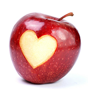 Apple with heart cut out of skin