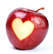 Apple with heart cut out of skin