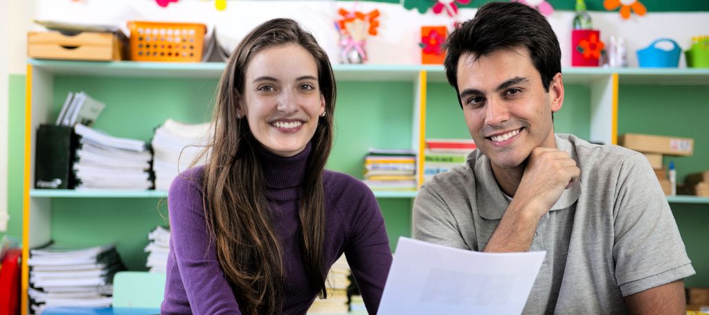 Woman and man at laptop